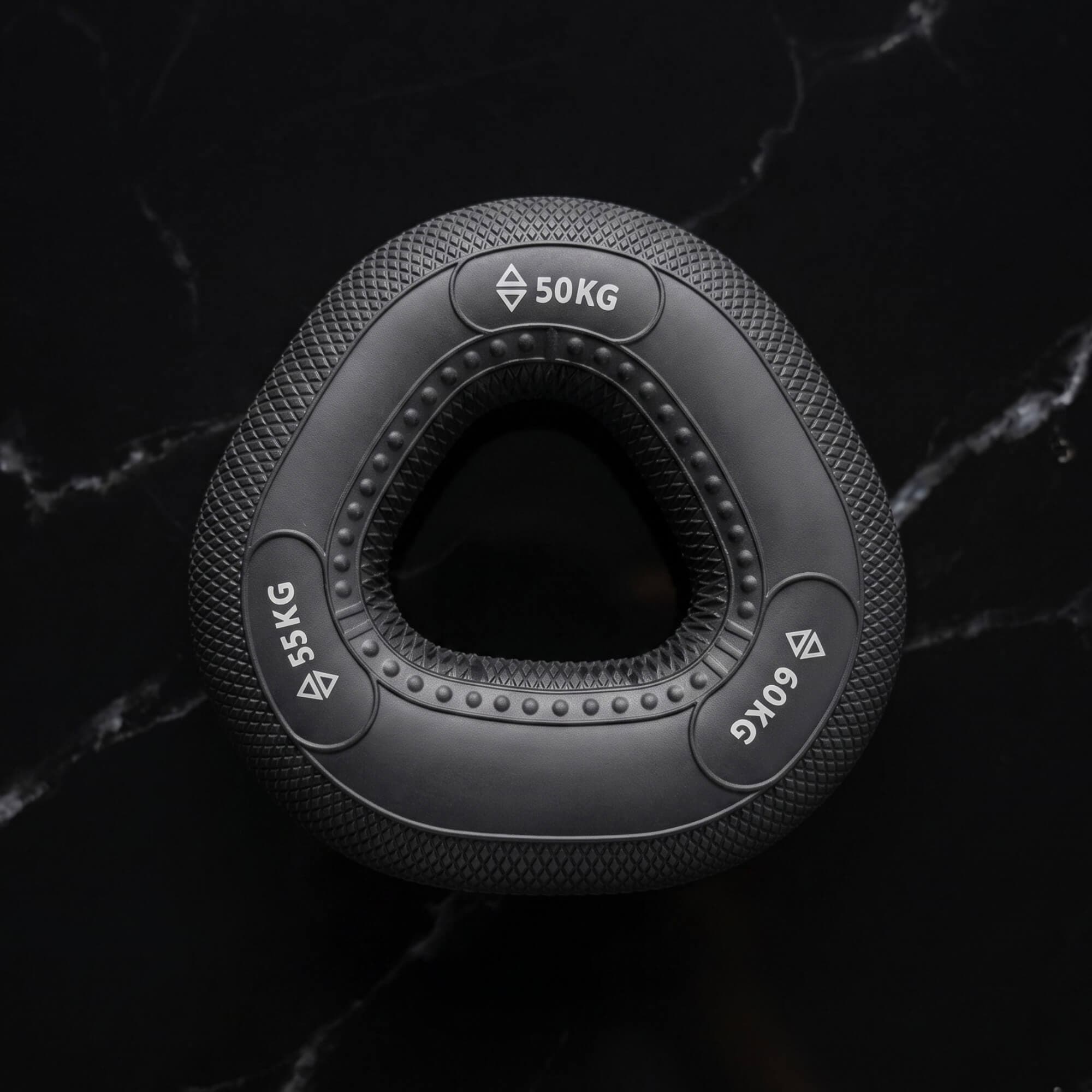 Onyx black grip ring, 50–60kg, on black marble