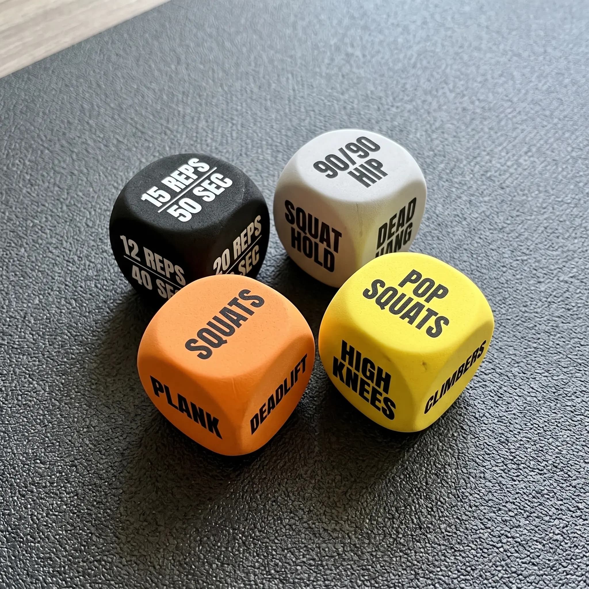 The four dice on a training mat